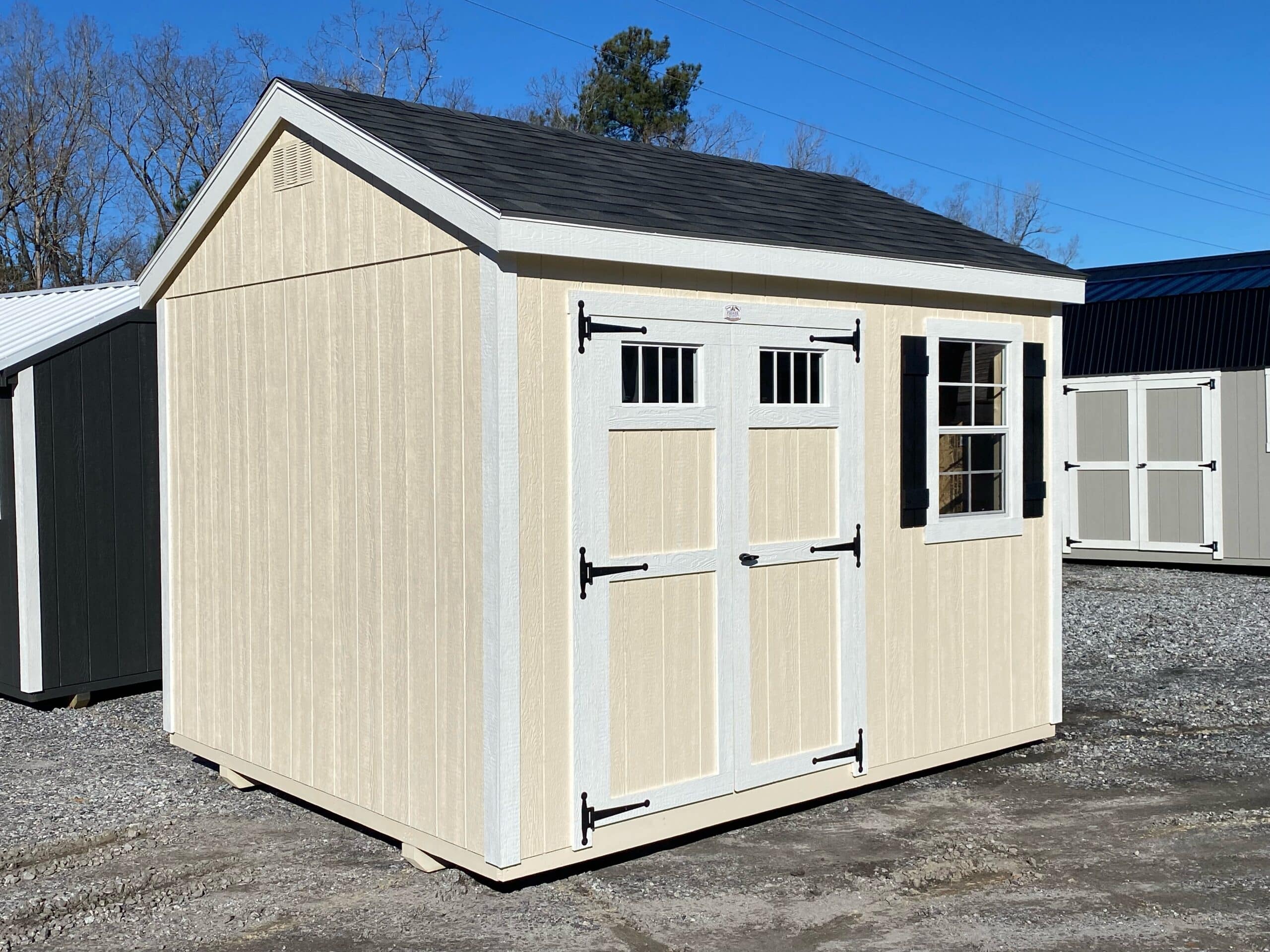 cream 10x12 CLASSIC workshop shed with white trim and black asphalt shingle roof for sale in SC