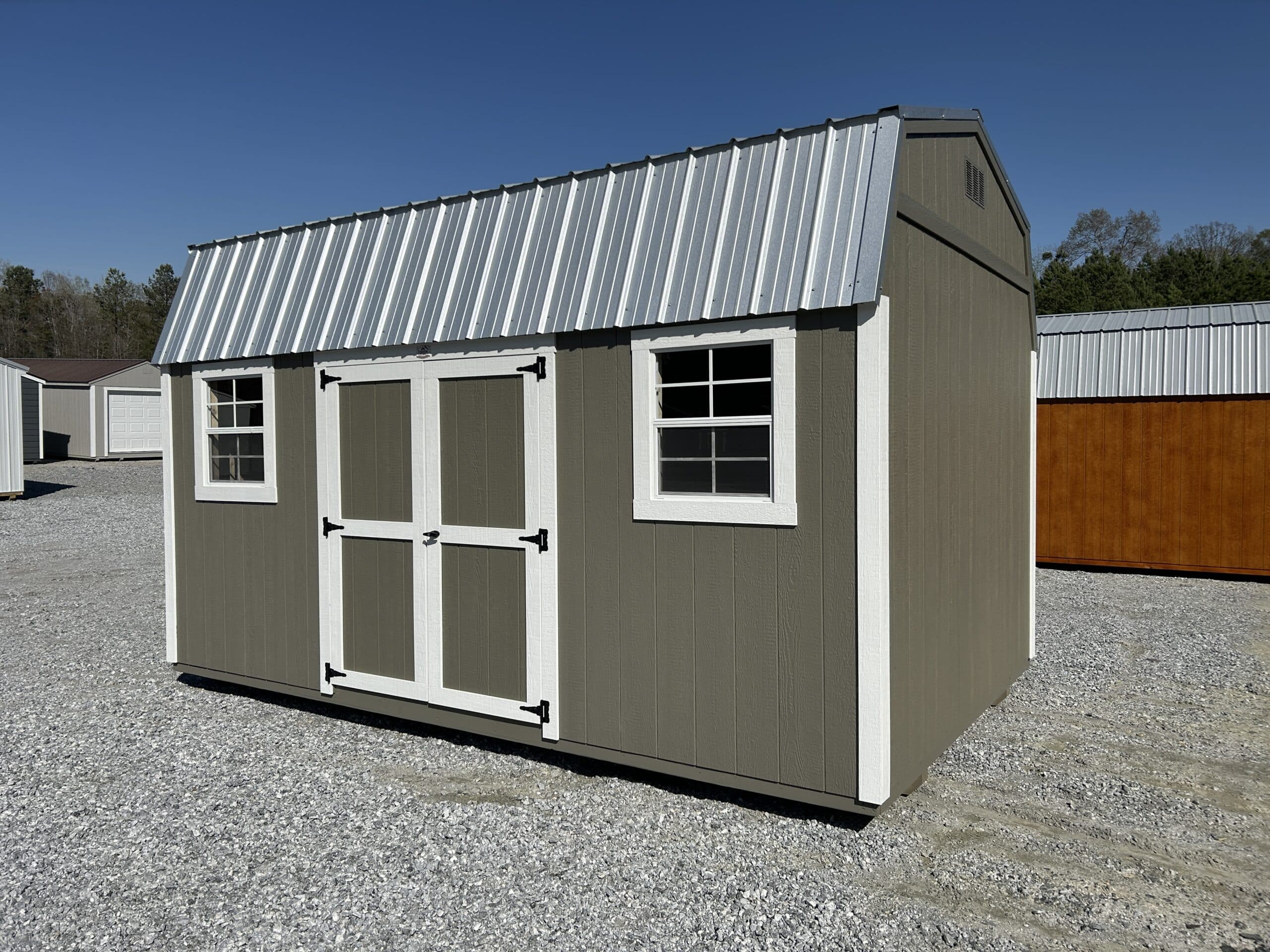 10x16 dark olive green dutchbarn shed with white trim and silver metal roof for sale in SC