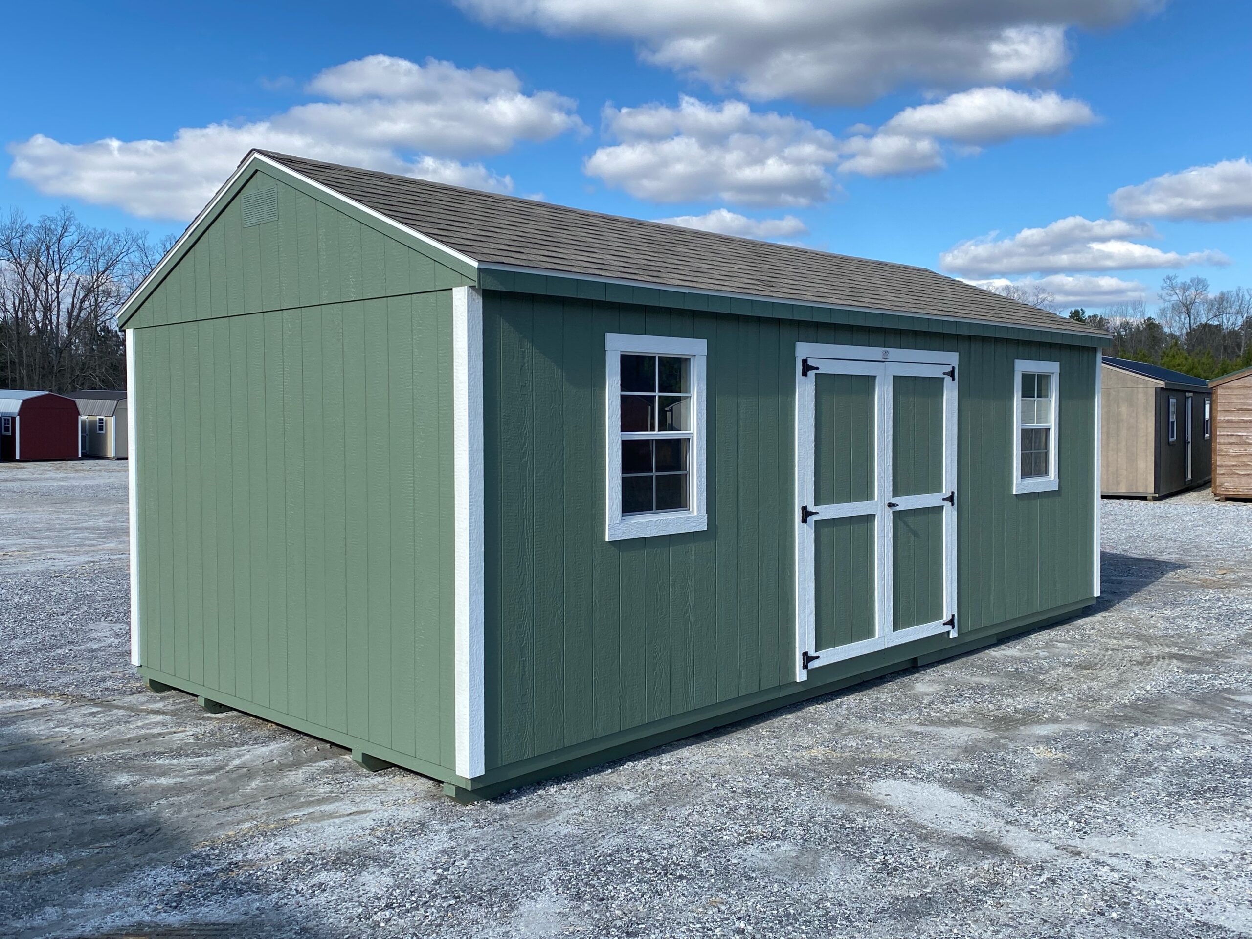 10x20 green WORKSHOP shed with white trim and slate asphalt shingle roof in SC