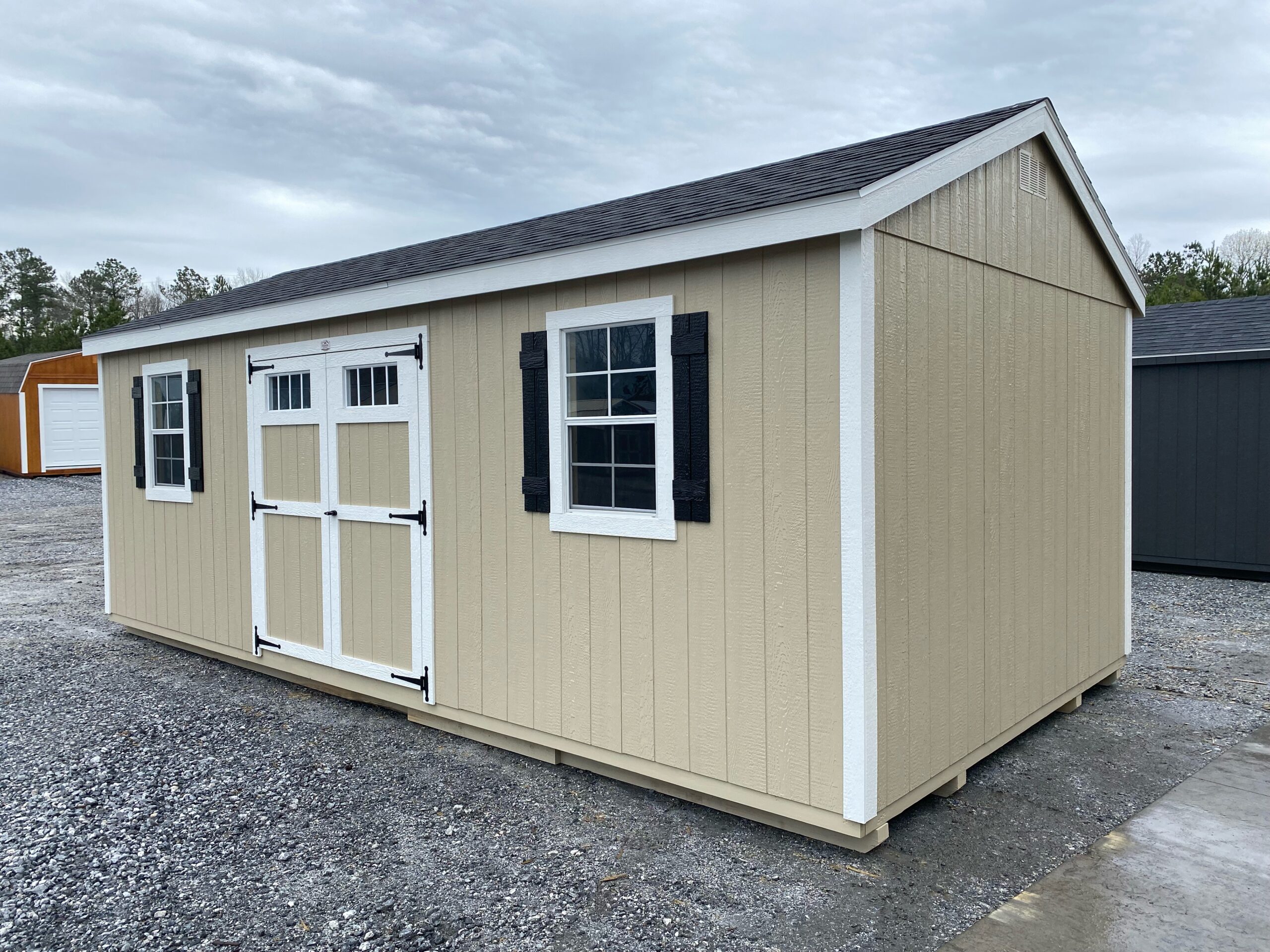 10x20 light stone painted CLASSIC workshop shed with white trim and charcoal asphalt shingle roof in SC