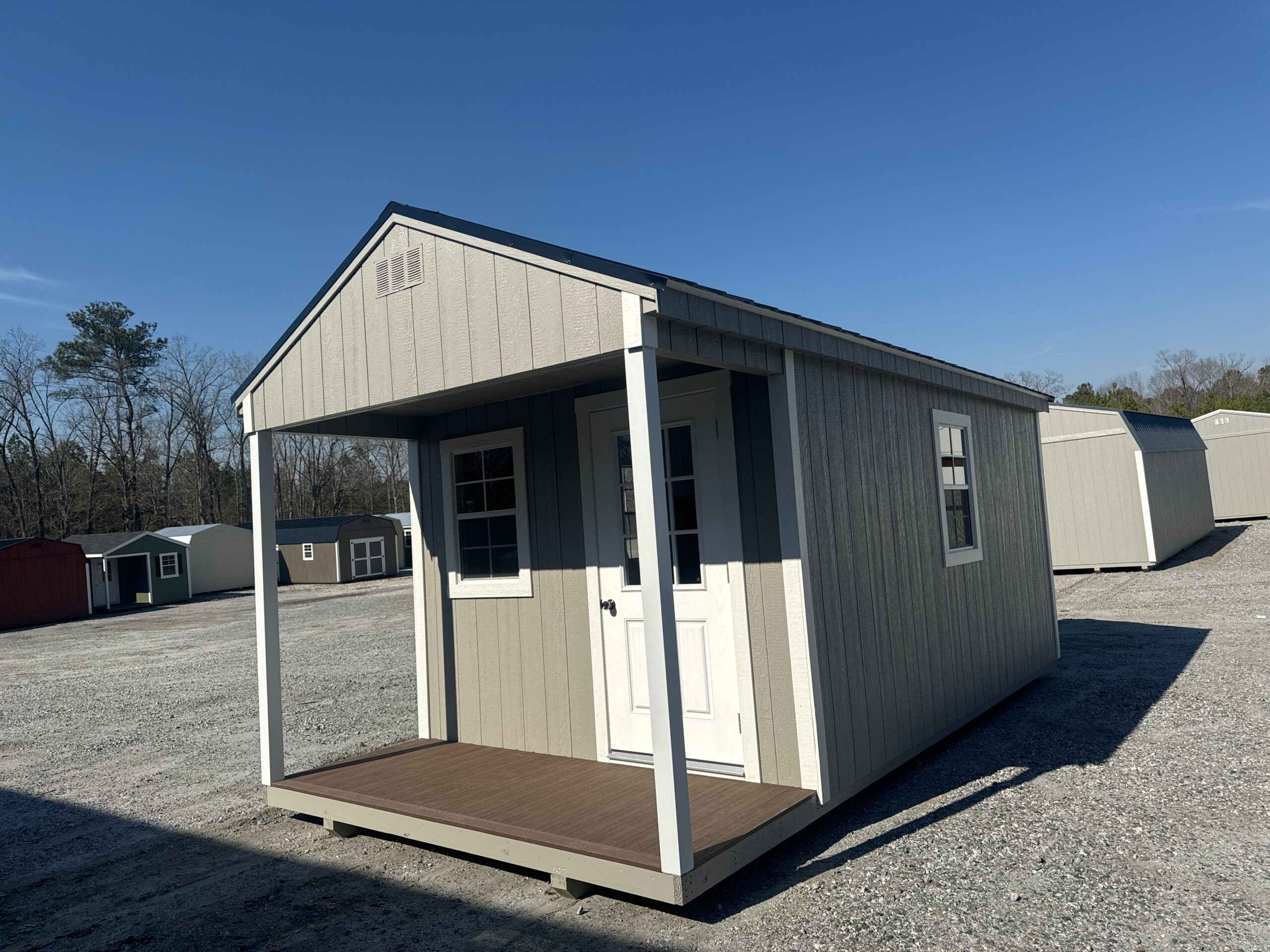 10x20 Almond the cabin shed with white trim and black metal roofing for sale in SC