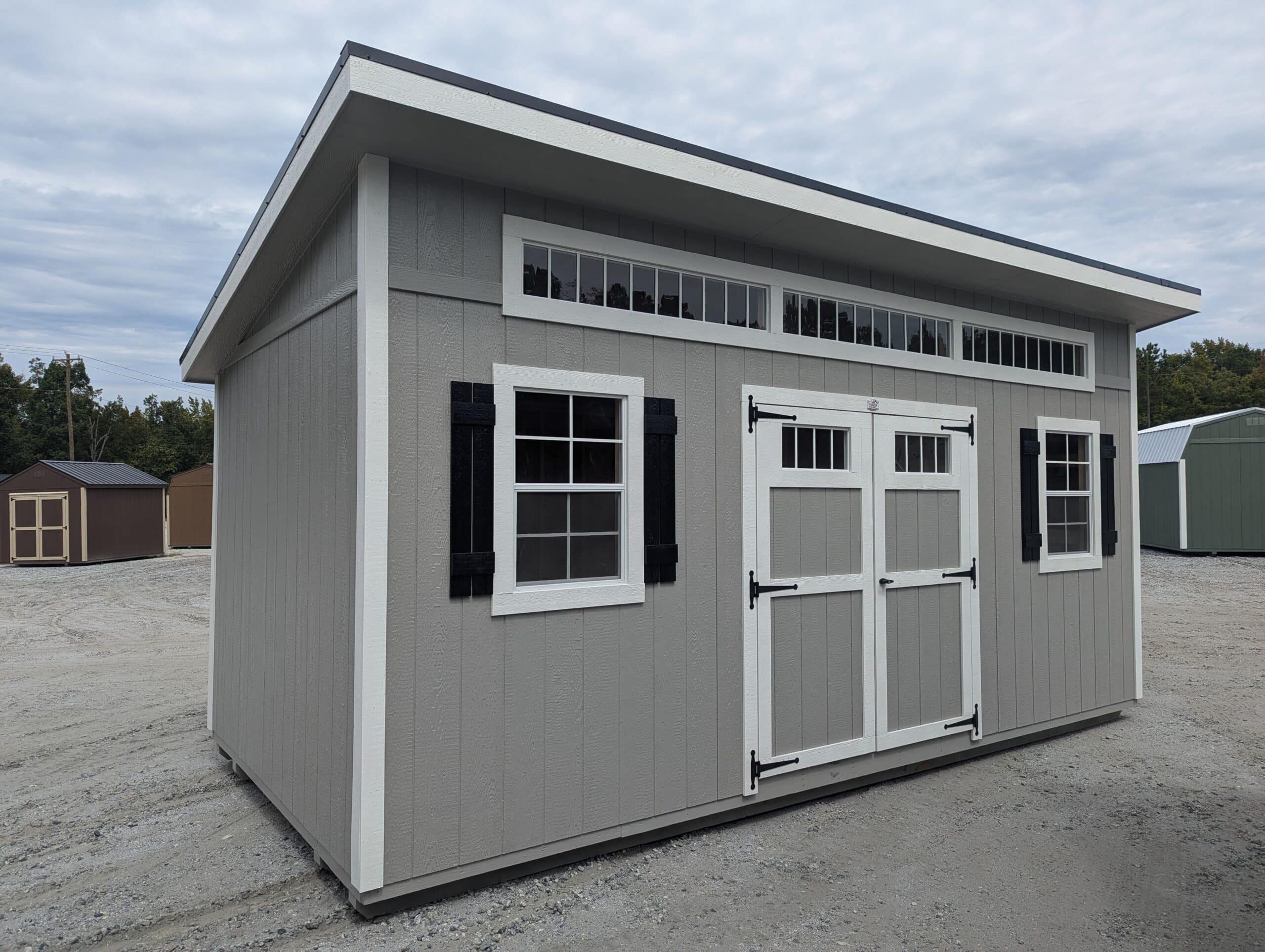 10x20 Grey Carolina Workshop shed with white trim and black metal roof for sale in SC