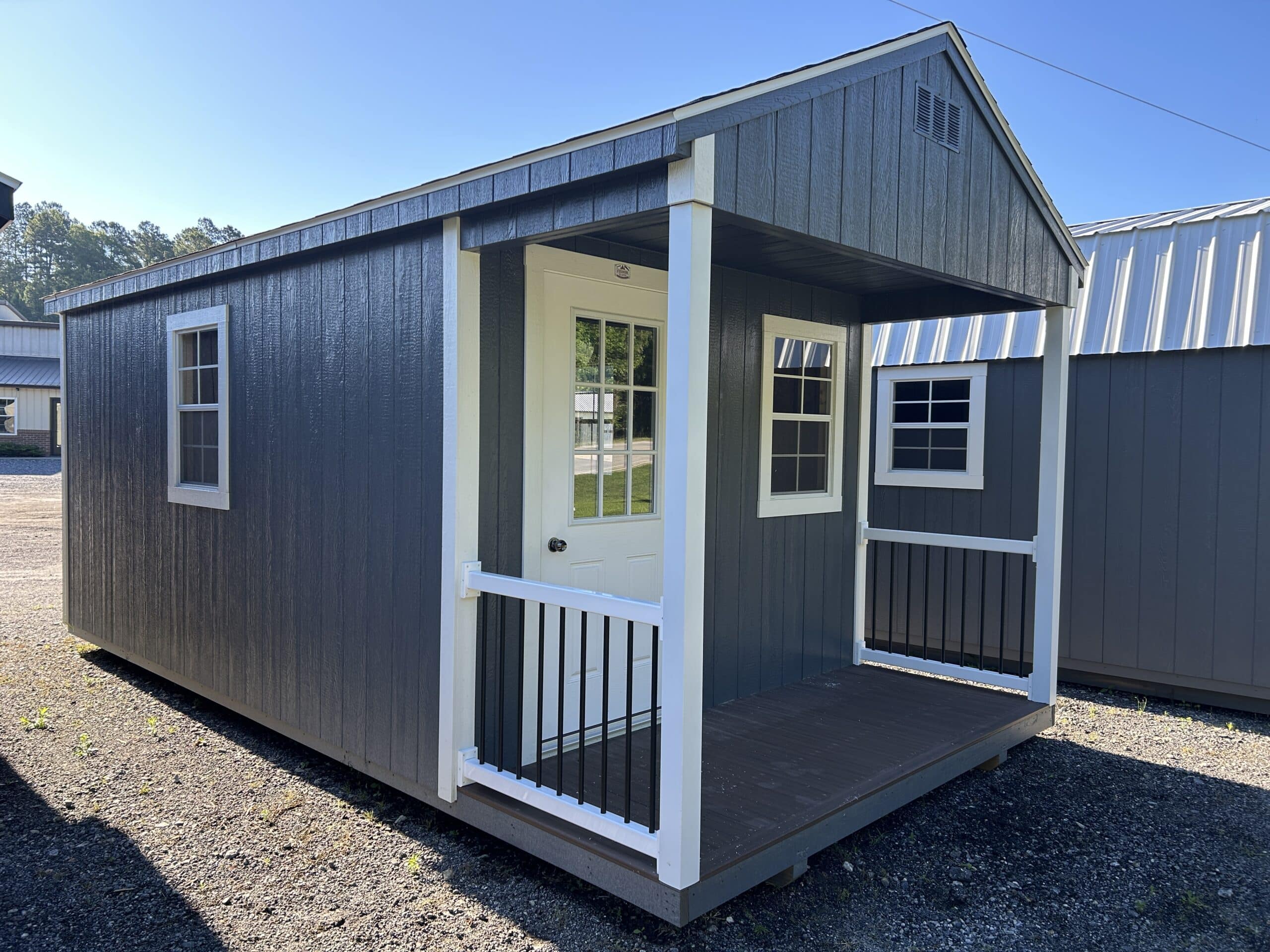 10x20 Grey The cabin shed with white trim and Charcoal asphalt shingle roof for sale in SC