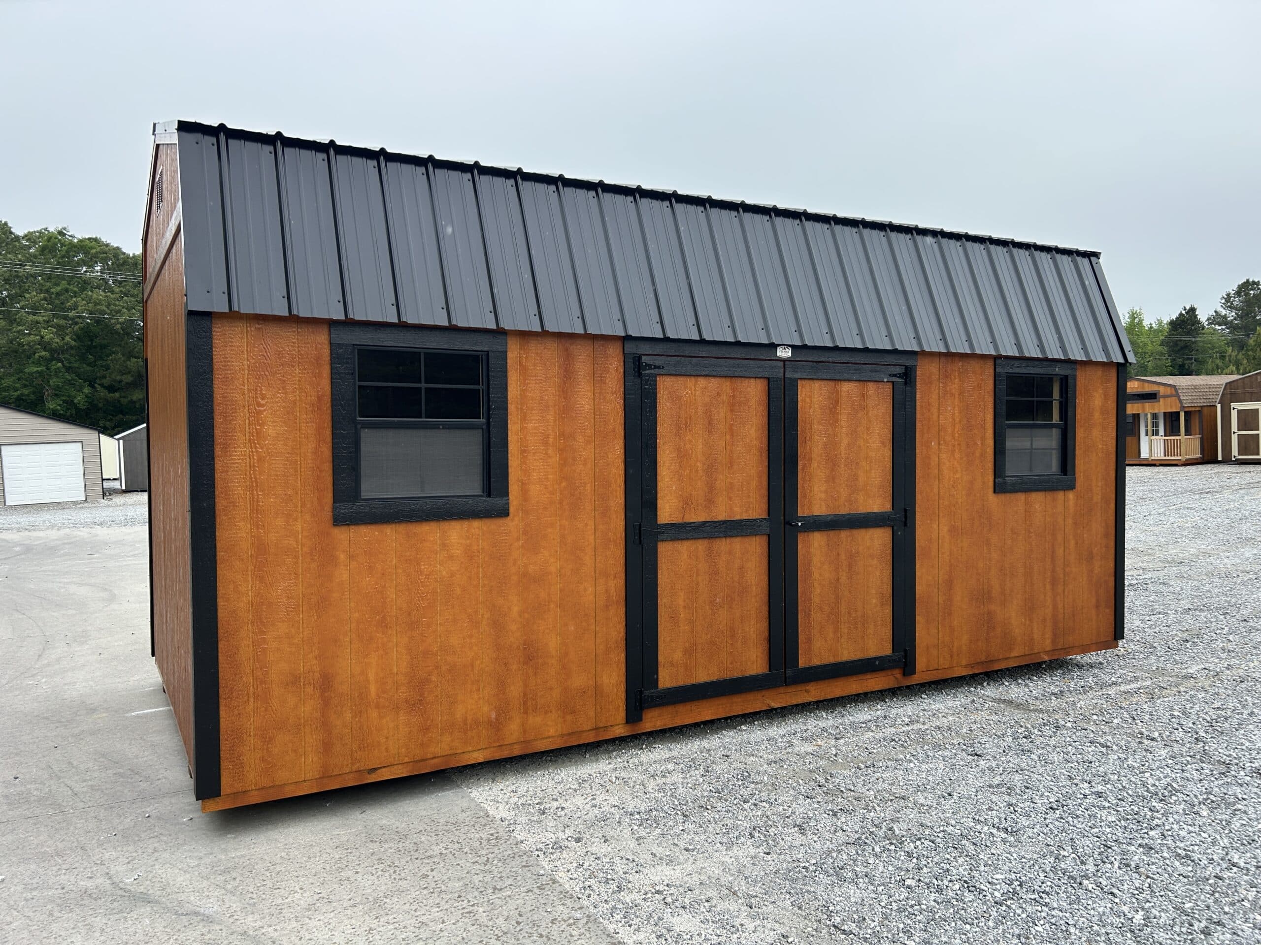 10x20 Mahogony stain wood sided Dutchbarn with black trim and black metal roofing for sale in SC