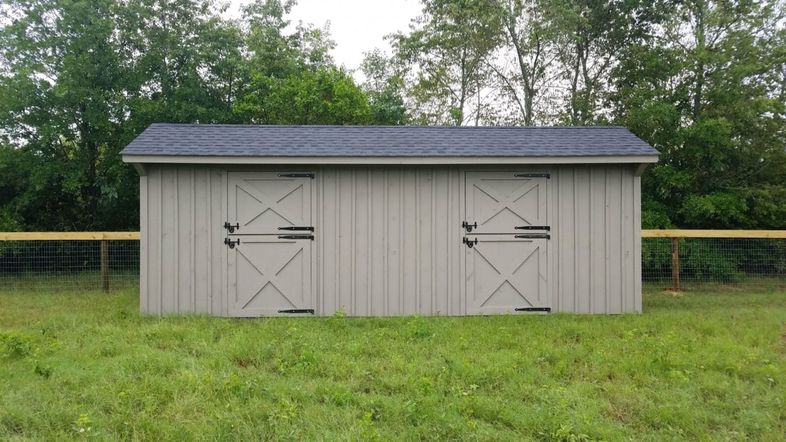 exterior of brown and black horse shed row barn for sale in greenwood SC