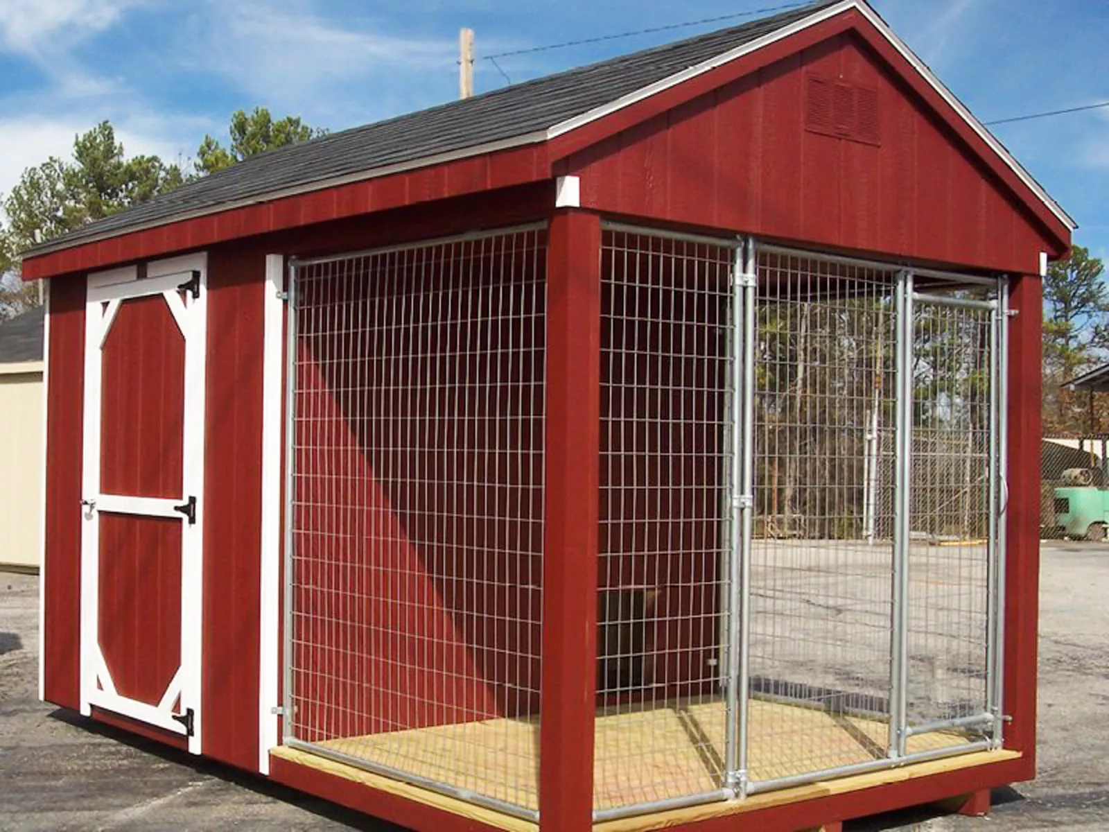 exterior picture of red and white enclosed outdoor dog kennel for sale in SC