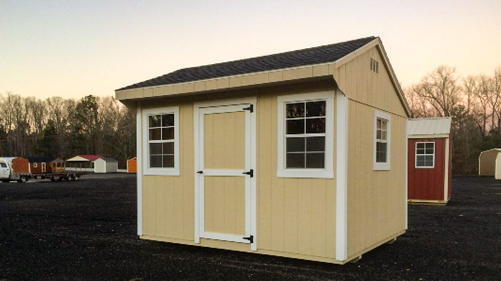 exterior of yellow pre-built storage shed for sale