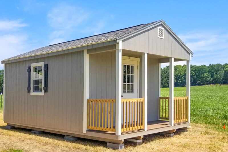 exterior of cabin shed for sale with a porch